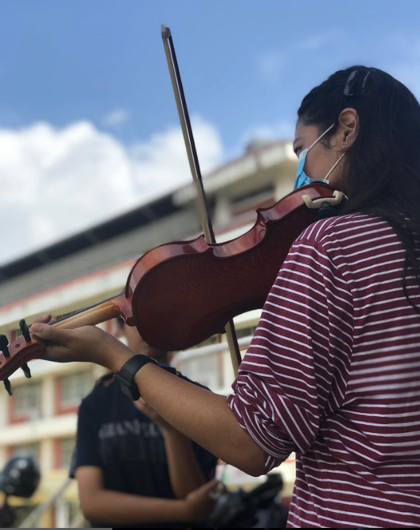 Aashra playing the violin